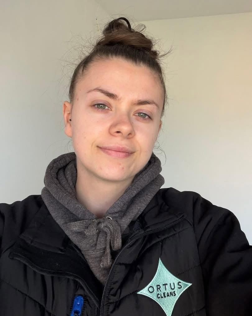 Tegan, founder of Ortus Cleans, in uniform